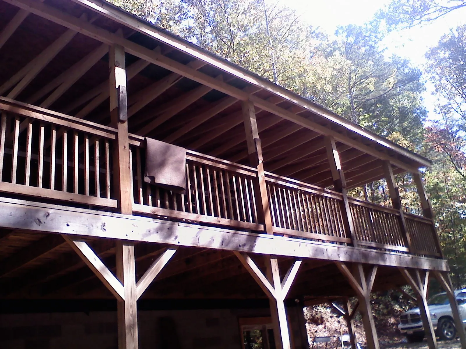 Timber framing under a new elevated porch and deck — Roof Leak Repair in Central Islip by Roofing Brothers
